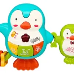 Sonajero Musical Bebé Expreso Polar Pingüino Celeste Con Luces Y Sonidos