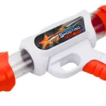 Dinosaurio Con Pistola De Lanza Dardo Pelota Juego Al Blanco Color Naranja